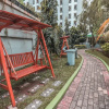Отель Super OYO Capital O 93910 Asia Rooms @ Green Lake View Ciputat, фото 18
