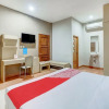 Отель OYO Flagship Tembok Batu Residence, фото 21