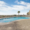 Отель Tranquil Condo With Multiple Pools on White Sands, фото 28