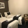 Отель Carlton Kensington Apartments, фото 3