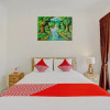 Отель OYO 90337 Wiguna Homestay, фото 23