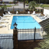 Отель Travelers Inn & Suites, фото 13