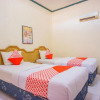 Отель Wisma Kuta Karang by Oyo Rooms, фото 5