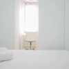 Отель Comfy and Stylish 2BR Emerald Bintaro Apartment, фото 6