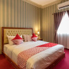 Отель Super OYO Capital O 293 Mutiara Hijau Suites Syariah, фото 4