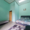 Отель OYO 90799 Sharhan Residence, фото 27