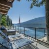 Отель All About The Lake 4 Bedroom Home by NW Comfy Cabins by RedAwning, фото 16
