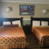 Отель Paradise Inn and Suites, фото 2