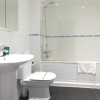 Отель Tudors eSuites Park Central Townhouse Garden and Parking, фото 9