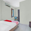 Отель OYO 91065 Guest House 19 Syariah, фото 6