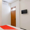 Отель OYO 1376 Kina Family Residence Syariah, фото 19