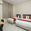 Отель OYO 90172 Goodwill Homestay, фото 11