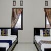 Отель OYO Life 92509 Maulana Guest House Simpur, фото 16