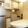 Отель Comfortable And Spacious Studio Apartment At Tamansari La Grande, фото 1