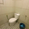 Отель OYO 1599 Naz Guesthouse Syariah, фото 7