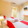 Отель Wisma Guntur II by OYO Rooms, фото 11