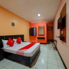 Отель OYO 861 Rosas Travellers Inn, фото 7