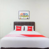 Отель OYO 1569 Kupula Guest House, фото 7