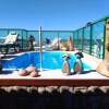 Отель Classe A Cobertura Guesthouse Cabo Frio в Кабу-Фриу