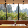 Отель Yangshuo Travelling With Hostel, фото 8