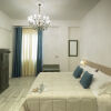 Отель Piazza Martiri Rooms в Кальяри 