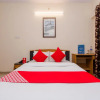 Отель OYO 12082 Om Apartment, фото 14
