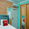 Отель OYO 91731 Home Stay Elis Cateliya Syariah, фото 14