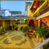 Отель Xinniu Inn (Lijiang Ancient City Dashuiche Shop), фото 15