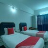 Отель OYO 24579 Flagship Hotel Padmam, фото 5