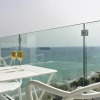 Отель The White Pearl Suite - beach front city centre with sea view., фото 8
