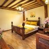 Отель Sifu Yashe Boutique Hotel в Лицзяне