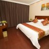 Отель GreenTree Inn Anhui Wuhu Wuhu County Yingbin Avenue World Trade South Building Express Hotel в Уху