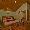 Отель OYO 8866 Mountain Face Cottage, фото 3