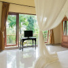 Отель RedDoorz @ Bangkilesan Mas Ubud, фото 1