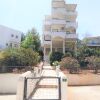 Отель Adelos Apartment with Garden Terrace near Vouliagmeni Beach, фото 1