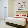 Отель Oyo 1076 Dmc Homestay, фото 7