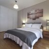 Отель Stunning Central Apartment, фото 6