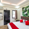 Отель OYO 458 Kathy's Home Garden Suites, фото 4