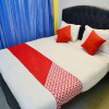 Отель OYO 13086 Temple City Guest House, фото 23