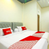 Отель OYO 90978 Khalifi Guesthouse Syariah, фото 3