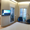 Отель Renovated Apartment with Roof Garden Access, 15 M Walk To Acropolis, фото 2