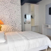 Отель Grand Peninsula Suites, фото 6
