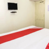 Отель OYO 14606 Holiday Inn, фото 4
