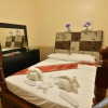 Отель Inn and Suites at Roz and Angeliques, фото 6