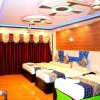 Отель Rooms with 1 king size bedded + 2 single Cart Beds + AC, фото 10