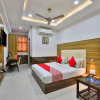 Отель OYO 15862 Infocity Hotel LLP, фото 6