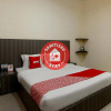 Отель OYO 1694 Pariban Homestay, фото 1