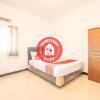 Отель OYO 863 Tenacity Guest House Syariah, фото 2