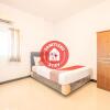 Отель OYO 863 Tenacity Guest House Syariah, фото 5