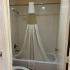 Отель Deluxe Inn & Suites, фото 12